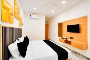 TV a/nebo společenská místnost v ubytování Super Hotel O Indriya