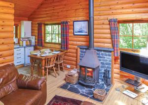 TV a/nebo společenská místnost v ubytování Loch Shuna Lodges + 19 fotografií