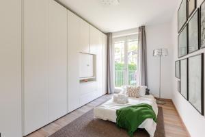 Ένα ή περισσότερα κρεβάτια σε δωμάτιο στο Bellagio Breeze of lake Como