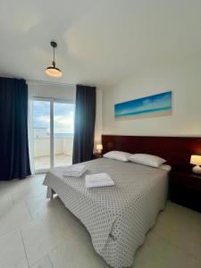 Letto o letti in una camera di Rooms del Moro