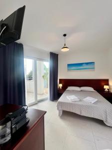 Letto o letti in una camera di Rooms del Moro