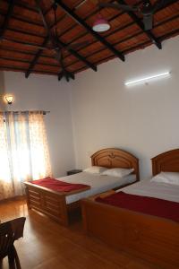 Postel nebo postele na pokoji v ubytování HULSE HOMESTAY