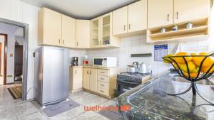 Dapur atau dapur kecil di Apartamento em Curitiba Conforto e Boa Localizacao