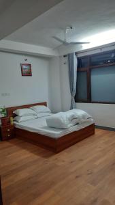 Postel nebo postele na pokoji v ubytování Abhi BNB Bed and Breakfast