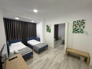 Postel nebo postele na pokoji v ubytování Hotel Stolis + 36 fotografií