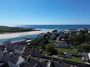 an aerial view of a town and the beach at Escape, splendid ocean view in Audierne