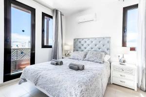 Postel nebo postele na pokoji v ubytování Villa Perla + 19 fotografií