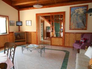a living room with a couch and a table at GiaMia Villas -Rural Central Italy Paradise in Sulmona