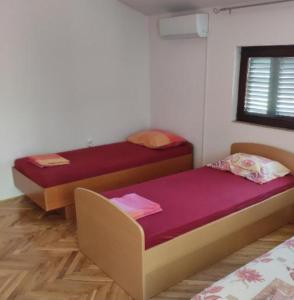 Postel nebo postele na pokoji v ubytování Eros Rooms