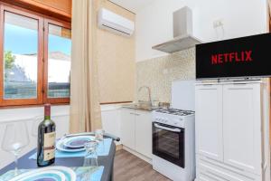 Η κουζίνα ή μικρή κουζίνα στο Nordlys Apartment - A due passi dal lungomare -
