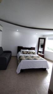 Postel nebo postele na pokoji v ubytování Hotel Mediterraneo