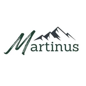 Un certificado, premio, letrero u otro documento en Haus Martinus