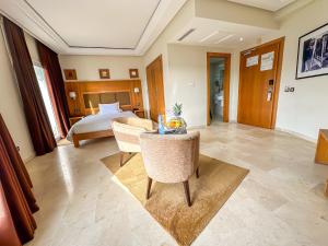 Postel nebo postele na pokoji v ubytování Hotel LA PALOMA