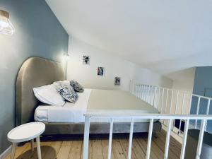Voodi või voodid majutusasutuse Nautilus B&B toas