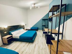 Voodi või voodid majutusasutuse Nautilus B&B toas