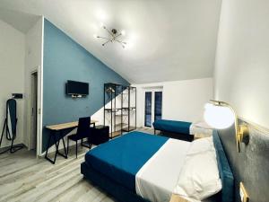 Postel nebo postele na pokoji v ubytování Nautilus B&B
