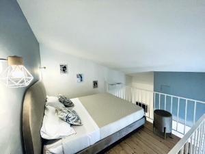 Voodi või voodid majutusasutuse Nautilus B&B toas