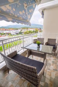 A balcony or terrace at Carpe Diem Rooms Nei Pori