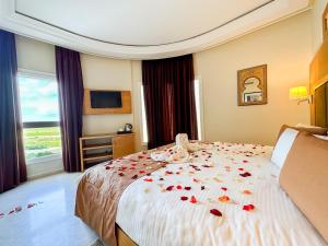 Postel nebo postele na pokoji v ubytování Hotel LA PALOMA