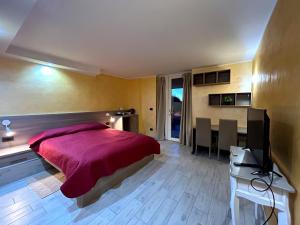 Postel nebo postele na pokoji v ubytování B&B La fontana nelle Langhe
