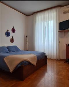 En eller flere senge i et værelse på La Finestra Sul Mare