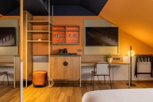 Łóżko lub łóżka w pokoju w obiekcie Mayburg Salzburg, a Tribute Portfolio Hotel