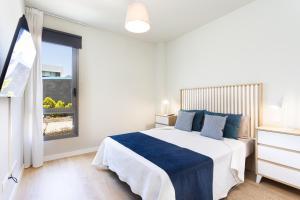 Postel nebo postele na pokoji v ubytování Moderno apartamento cerca del mar en Tenerife