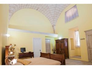 TV a/nebo společenská místnost v ubytování Palazzo Mellacqua