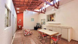 a room with a table and chairs in a building at POUSADA NOVA BARãO in Campinas +15 photos