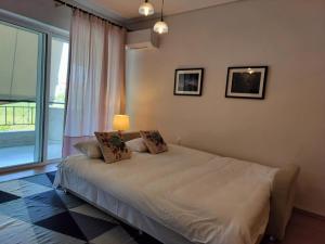 Posteľ alebo postele v izbe v ubytovaní Orion - Charming 1-bedroom condo at convenient location.