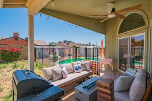 a screened in porch with a couch and a grill at Private Pool & Fully Fenced Yard Near Mntn Park in Glendale