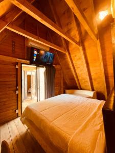 Postel nebo postele na pokoji v ubytování CABAÑA TRIANGULAR Tulumcito
