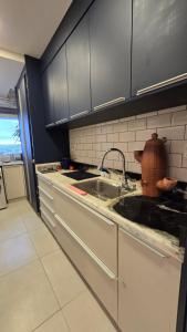 Køkken eller tekøkken på Casa ArthÁbio - Barra Olímpica