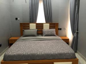 Postel nebo postele na pokoji v ubytování Circle staycation