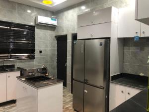 Kuchyň nebo kuchyňský kout v ubytování Circle staycation