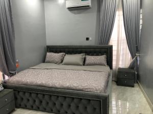 Postel nebo postele na pokoji v ubytování Circle staycation