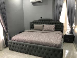 Postel nebo postele na pokoji v ubytování Circle staycation