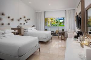 Ліжко або ліжка в номері Hyatt Regency Grand Reserve Puerto Rico +37 фото