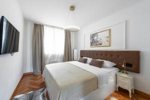 Postel nebo postele na pokoji v ubytování Apartment One , sea view , free parking