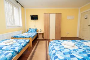 Rúm í herbergi á Sobe Joksimović