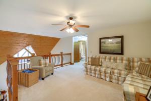 a living room with couches and a ceiling fan at Mountain Condo 2 Mi to Dtwn Banner Elk with Views! in Banner Elk +18 photos