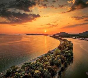 an aerial view of a beach at sunset at Nastas-Home in Igoumenitsa