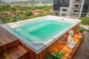a swimming pool on the balcony of a building at Aparta estudio en el edificio bahia 79 apartasuites in Cartagena de Indias