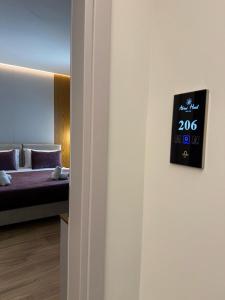 Postel nebo postele na pokoji v ubytování Afrimi Hotel