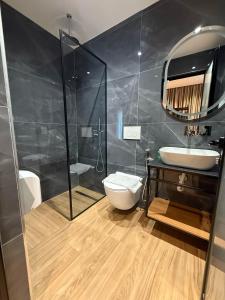 Koupelna v ubytování Afrimi Hotel