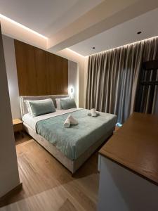 Postel nebo postele na pokoji v ubytování Afrimi Hotel