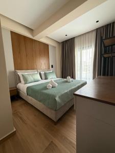 Postel nebo postele na pokoji v ubytování Afrimi Hotel