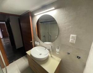 Koupelna v ubytování Iris Central Home + 5 fotografií