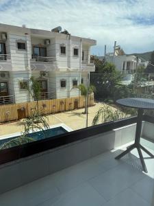 Balkón nebo terasa v ubytování Afrimi Hotel + 25 fotografií
