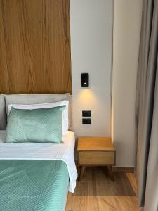 Postel nebo postele na pokoji v ubytování Afrimi Hotel